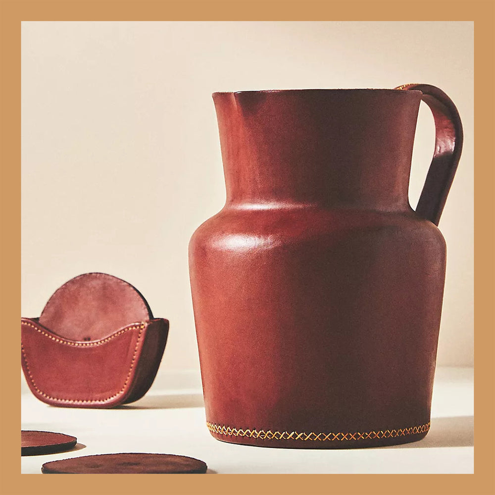 Bati | Natural Leather Carafe | Brown Leather Pitcher | Leather Cup | Leather Coaster Set | Luxury Bar Accessories | Leather Candle Handle | Leather Glass Holder | Leather Vase | Leather Tote | Leather Purse | Leather Bags