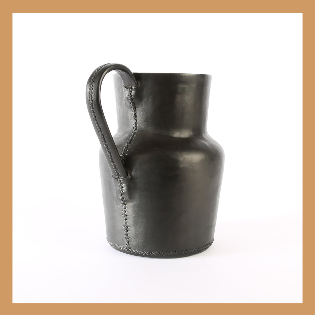 Bati | Natural Leather Carafe | Black Leather Pitcher | Leather Cup | Leather Coaster Set | Luxury Bar Accessories | Leather Candle Handle | Leather Glass Holder | Leather Vase | Leather Tote | Leather Purse | Leather Bags