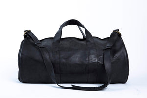 Bati | Black Leather Duffel Bag | Handmade Leather Goods from Paraguay | Leather weekender, leather duffel bag, leather duffels, leather accessories, bati
